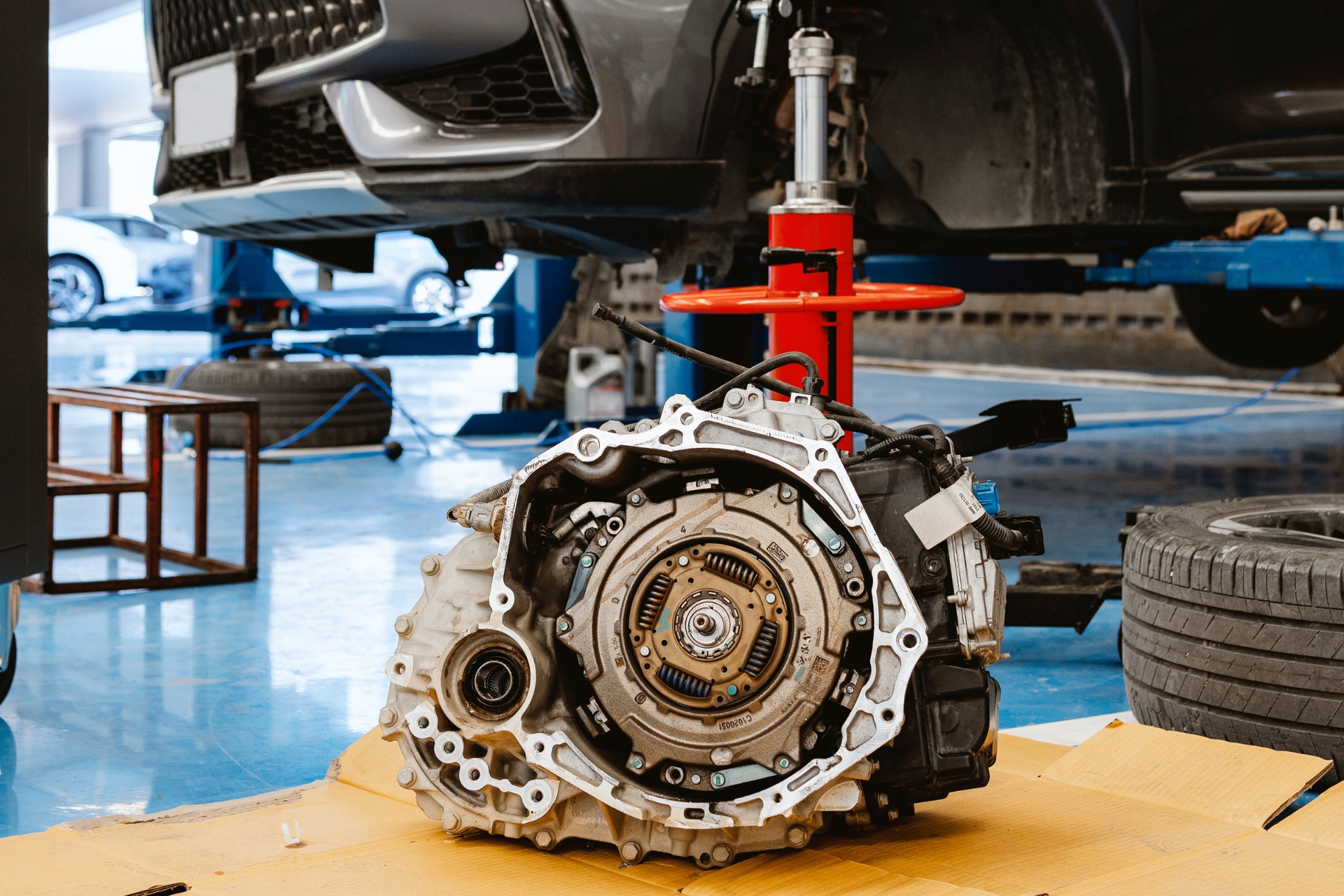 Transmission removed from vehicle during repair in an automotive service shop