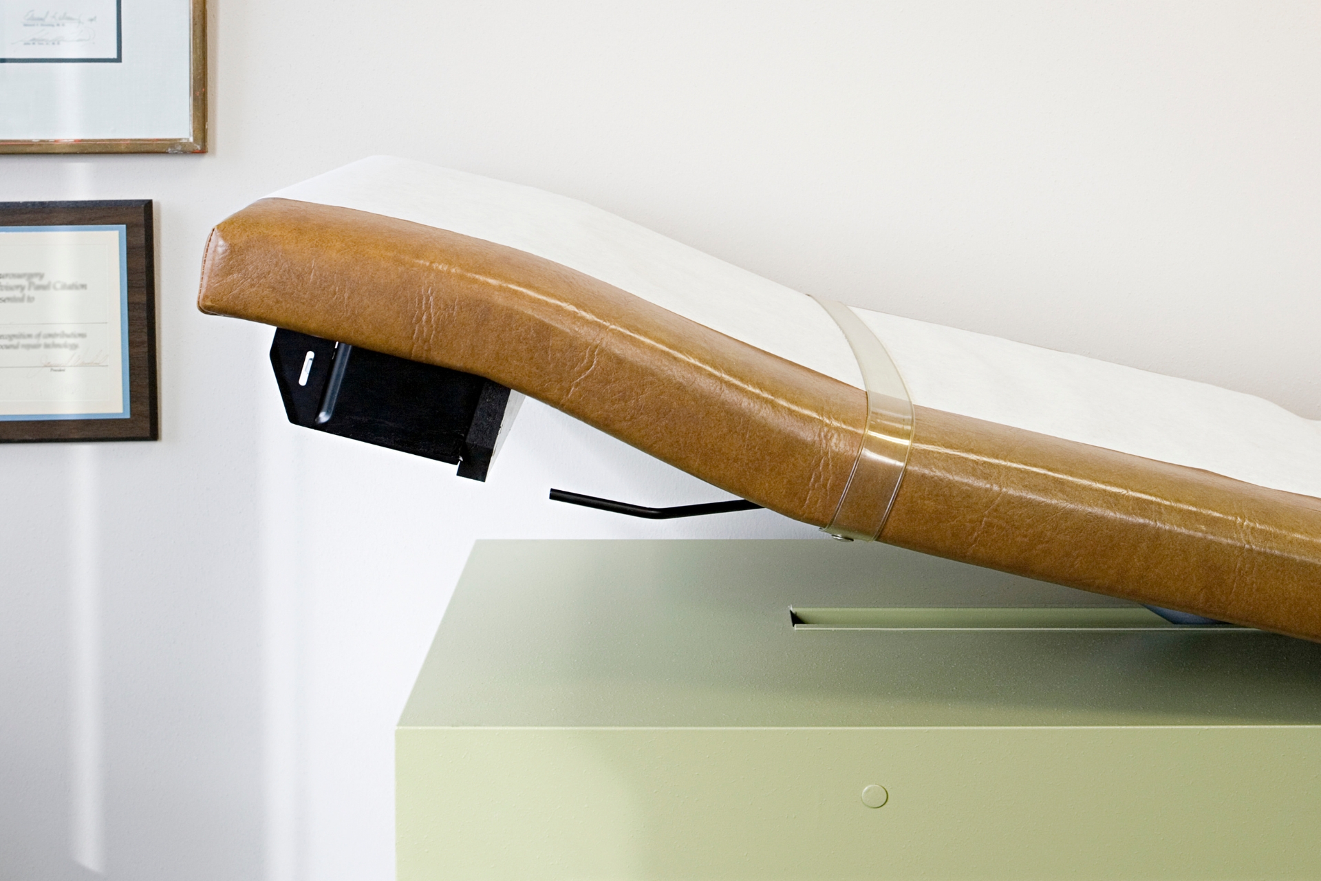 Chiropractic adjustment table in clinic treatment room
