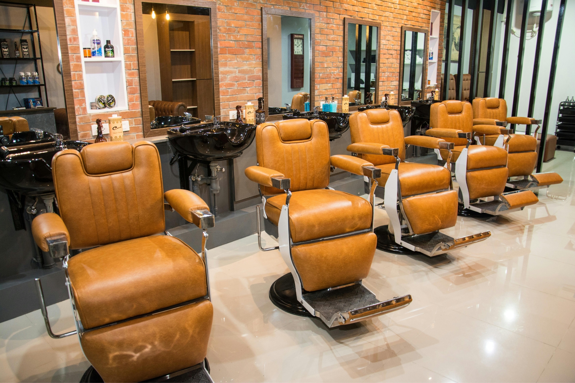 hair salon interior with styling chairs, mirrors, and professional equipment set up for client services</p>
<p>barbershop interior with multiple barber chairs, mirrors, and wash stations ready for client services