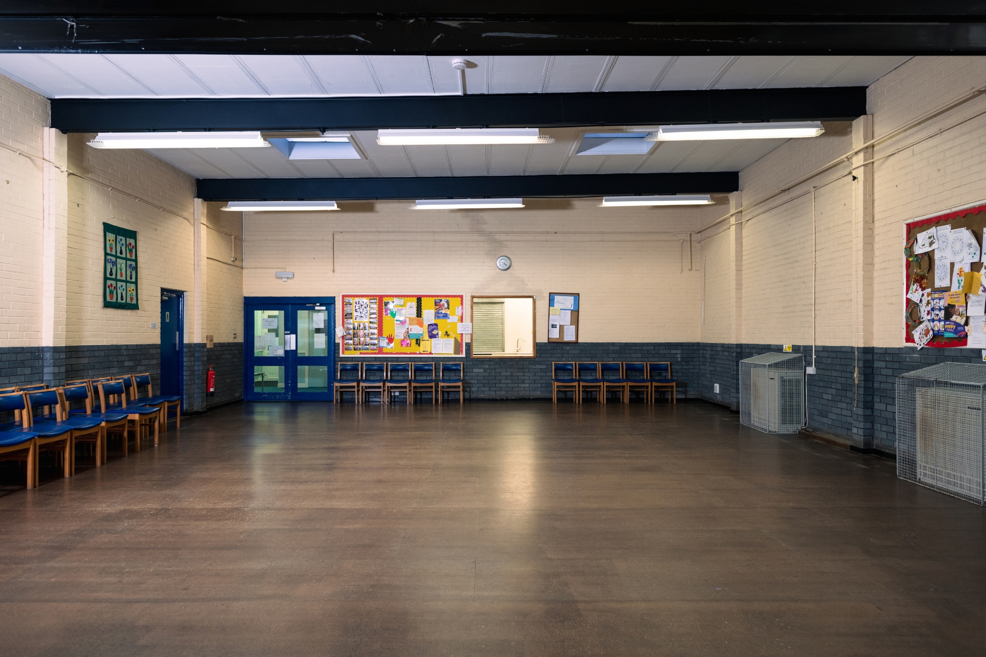 Community center multipurpose room with seating and open floor space for events